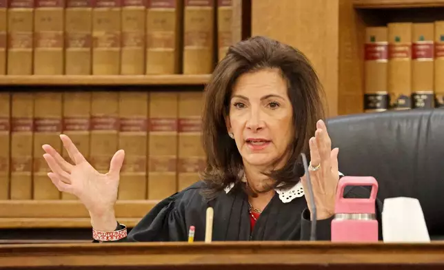 Judge Diane Freniere gives instructions to the lawyers during Brian Walshe's murder trial, Friday, Dec. 12, 2025, in Dedham, Mass. (Stuart Cahill/The Boston Herald via AP, Pool)