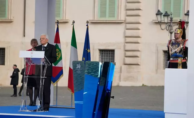 Italian President Sergio Mattarella delivers his speech during the Milan Cortina 2026 Winter Olympics cauldron lighting, in front of the Quirinale Presidential Palace, in Rome, Friday Dec. 5, 2025. (AP Photo/Gregorio Borgia)