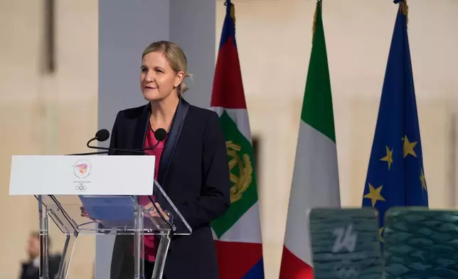 International Olympic Committee President Kirsty Coventry delivers her speech during the Milan Cortina 2026 Winter Olympics cauldron lighting, in front of the Quirinale Presidential Palace, in Rome, Friday Dec. 5, 2025. (AP Photo/Gregorio Borgia)