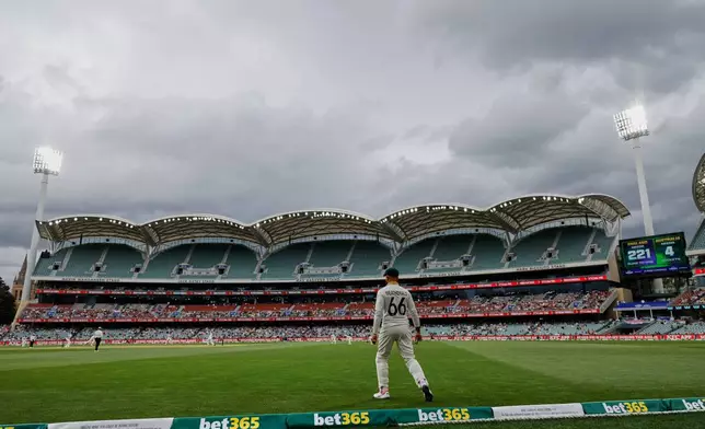 Australia's Jake Weatherald fields near the boundary during play on the final day of the third Ashes cricket test between England and Australia in Adelaide, Australia, Sunday, Dec. 21, 2025. (AP Photo/James Elsby)