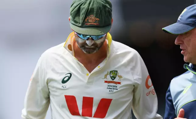 Australia's Nathan Lyon walks from the field during play on the final day of the third Ashes cricket test between England and Australia in Adelaide, Australia, Sunday, Dec. 21, 2025. (AP Photo/James Elsby)
