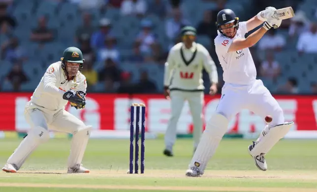 England's Jamie Smith bats during play on the final day of the third Ashes cricket test between England and Australia in Adelaide, Australia, Sunday, Dec. 21, 2025. (AP Photo/James Elsby)