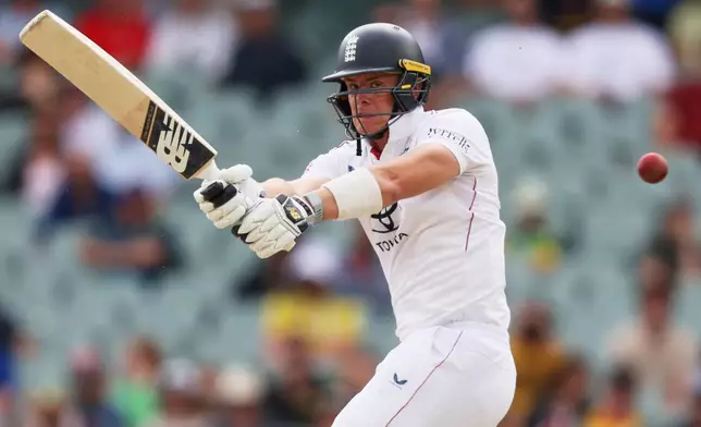 England's Jamie Smith bats during play on the final day of the third Ashes cricket test between England and Australia in Adelaide, Australia, Sunday, Dec. 21, 2025. (AP Photo/James Elsby)