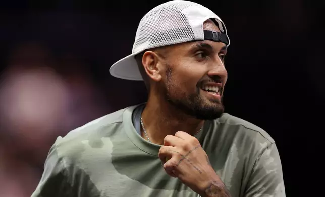 Nick Kyrgios reacts during his Battle of the Sexes tennis match against Aryna Sabalenka, in Dubai, United Arab Emirates, Sunday Dec. 28, 2025. (Amr Alfiky/Pool Photo via AP)