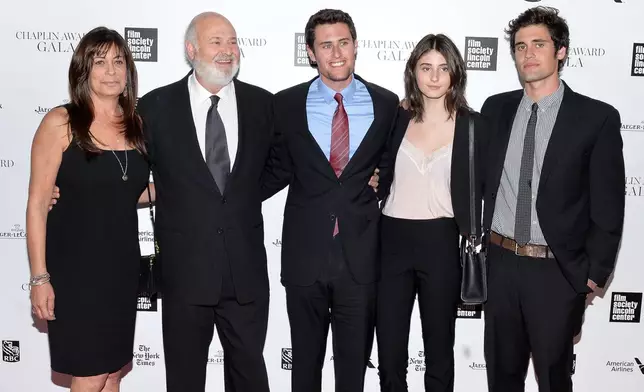 Honoree Rob Reiner, second from left, poses with his wife Michele and children Jake Reiner, Romy Reiner and Nick Reiner at the 41st Annual Chaplin Award Gala at Avery Fisher Hall on Monday, April 28, 2014 in New York. (Photo by Evan Agostini/Invision/AP)