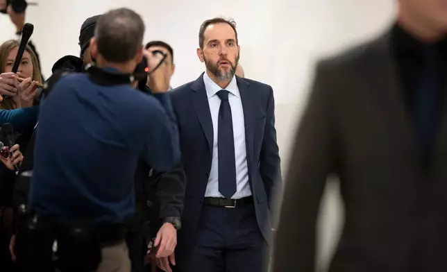 Former Department of Justice Special Counsel Jack Smith arrives under subpoena for a House Judiciary Committee deposition as part of its oversight into DOJ investigations into President Donald Trump, on Capitol Hill in Washington, Wednesday, Dec. 17, 2025. (AP Photo/J. Scott Applewhite)