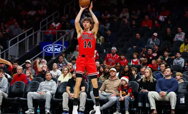 Chicago Bulls forward Matas Buzelis shoots during the first half of an NBA basketball game against the Atlanta Hawks, Sunday, Dec. 21, 2025, in Atlanta. (AP Photo/Colin Hubbard)