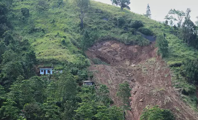A general view of the landslides is shown in Sarasavigama village in Kandy, Sri Lanka, Monday, Dec. 1, 2025. (AP Photo/Eranga Jayawardena)