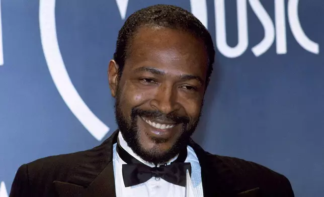FILE - Marvin Gaye, winner of Favorite Soul/R&amp;B Single, "Sexual Healing," attends the American Music Awards in Los Angeles on Jan. 17, 1983. (AP Photo/Doug Pizac, File)