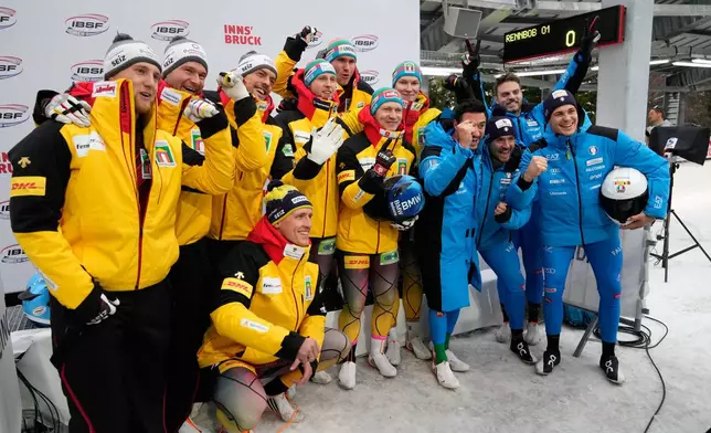 Second place Johannes Lochner, Thorsten Margis, Joern Wenzel and Georg Fleischhauer, of Germany, winners Francesco Friedrich, Tim Becker, Alexander Schueller and Felix Straub, of Germany, and third placed Patrick Baumgartner, Eric Fantazzini, Robert Mircea and Lorenzo Bilotti, of Italy, from left, pose after the 4-man bobsleigh race at the Bobsleigh World Cup in Innsbruck, Austria, Sunday, Nov. 30, 2025. (AP Photo/Matthias Schrader)