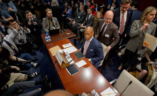 FILE - New York City Mayor Eric Adams takes his seat at the witness table during a House Committee on Oversight and Government Reform hearing with Sanctuary City Mayors on Capitol Hill, March 5, 2025, in Washington. (AP Photo/Rod Lamkey, Jr., File)
