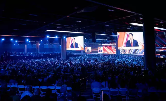 Michael Knowles speaks during Turning Point USA's AmericaFest 2025, Thursday, Dec. 18, 2025, in Phoenix. (AP Photo/Jon Cherry)