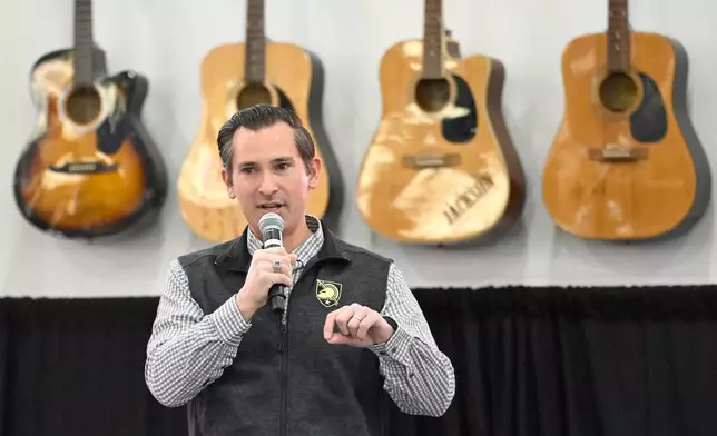 Republican U.S Congressional candidate for the seventh district Matt Van Epps speaks to supporters during a rally Monday, Dec. 1, 2025, in Franklin, Tenn. (AP Photo/John Amis)