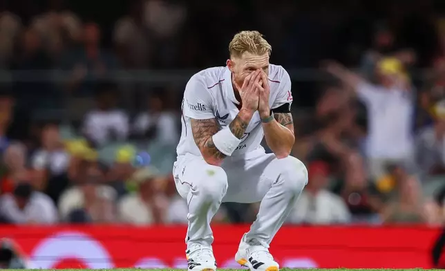 England's captain Ben Stokes reacts after bowls a delivery during the second Ashes cricket test match between Australia and England in Brisbane, Friday, Dec. 5, 2025.. (AP Photo/Tertius Pickard)