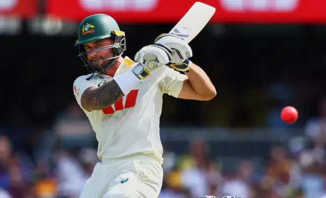 Australia's Jake Weatherald plays a shot during the second Ashes cricket test match between Australia and England in Brisbane, Friday, Dec. 5, 2025.. (AP Photo/Tertius Pickard)