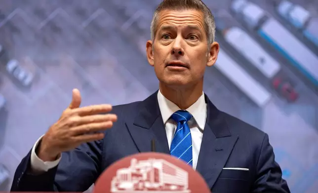 Transportation Secretary Sean Duffy speaks during a news conference at the Department of Transportation in Washington, Friday, Dec. 12, 2025. (AP Photo/Mark Schiefelbein)