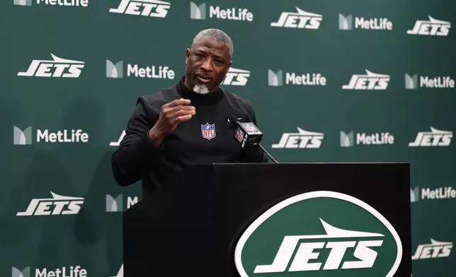 New York Jets head coach Aaron Glenn talks to the media during a news conference following a loss to the New England Patriots in an NFL football game, Sunday, Dec. 28, 2025, in East Rutherford, N.J. (AP Photo/Adam Hunger)