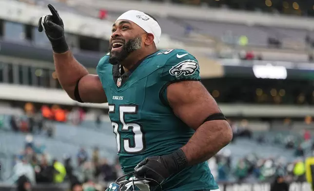 Philadelphia Eagles defensive end Brandon Graham gestures as he leaves the field after an NFL football game against the Las Vegas Raiders on Sunday, Dec. 14, 2025, in Philadelphia. (AP Photo/Matt Rourke)