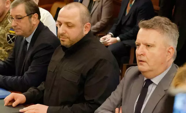 Ukrainian officials, from left, Vadym Skibitskyi, Deputy Chief to the Head of the Defence Intelligence , Rustem Umerov, Secretary of the National Security, and Sergiy Kyslytsia, First Deputy Foreign Minister look on during a meeting with U.S. officials Sunday, Nov. 30, 2025, in Hallandale Beach, Fla. (AP Photo/Terry Renna)
