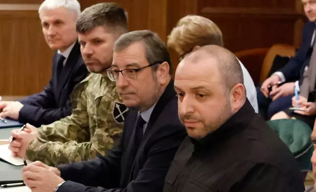 Ukrainian officials, left to right, Oleg Ivashchenko, Head of the Foreign Intelligence Service, Andrii Hnatov, Chief of the General Staff, Vadym Skibitskyi, Deputy Chief to the Head of the Defence Intelligence and Rustem Umerov, Secretary of the National Security, look on during a meeting, Sunday, Nov. 30, 2025, in Hallandale Beach, Fla. (AP Photo/Terry Renna)