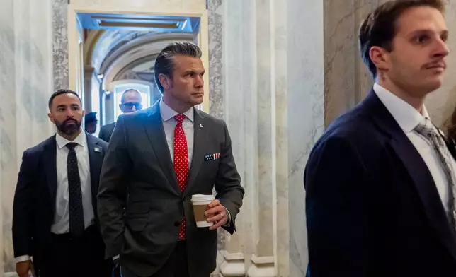 Defense Secretary Pete Hegseth departs the Capitol after briefing members of Congress on military strikes near Venezuela, Tuesday, Dec. 16, 2025, in Washington. (AP Photo/Julia Demaree Nikhinson)