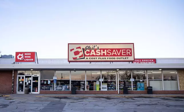 CORRECTS PHOTOGRAPHER A general view of Phil's Cashsaver is seen where a shooting had occurred earlier that morning, in Omaha, Neb., Wednesday, Dec. 3, 2025. (Matthew Mueller/Omaha World-Herald via AP)