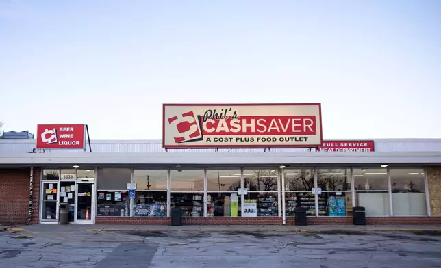 A general view of Phil's Cashsaver, is seen where a shooting had occurred earlier that morning, in Omaha, Neb., Wednesday, Dec. 3, 2025. (Chris Machian/Omaha World-Herald via AP)