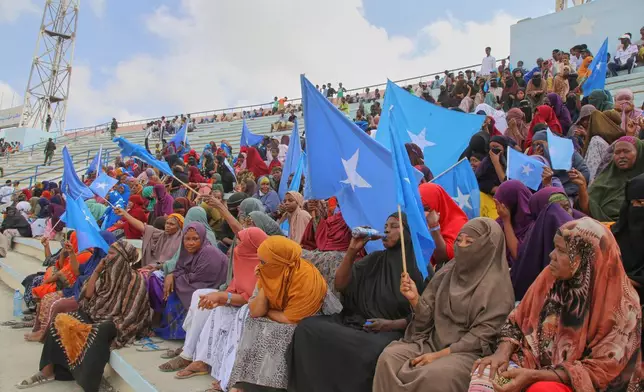 Hundreds of Somalis gather at the Mogadishu stadium as they protest Israel's recognition of Somalia's breakaway region of Somaliland as an independent nation, in Mogadishu, Somalia, Tuesday, Dec. 30, 2025. (AP photo/Farah Abdi Warsameh)