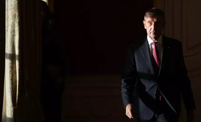 Leader of ANO 2011 political movement Andrej Babis arrives to be sworn in as the country's new prime minister at the Prague Castle in Prague, Czech Republic, Tuesday, Dec. 9, 2025. (AP Photo/Petr David Josek)