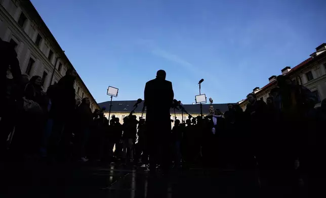 Leader of ANO political movement Andrej Babis addresses the media after being sworn in as the country's new prime minister at the Prague Castle in Prague, Czech Republic, Tuesday, Dec. 9, 2025. (AP Photo/Petr David Josek)