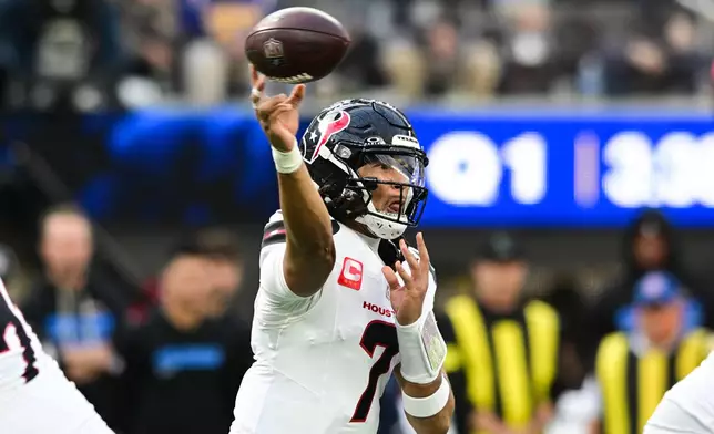 Houston Texans quarterback C.J. Stroud (7) throws a pass during the first half of an NFL football game against the Los Angeles Chargers Saturday, Dec. 27, 2025, in Inglewood, Calif. (AP Photo/Wally Skalij)