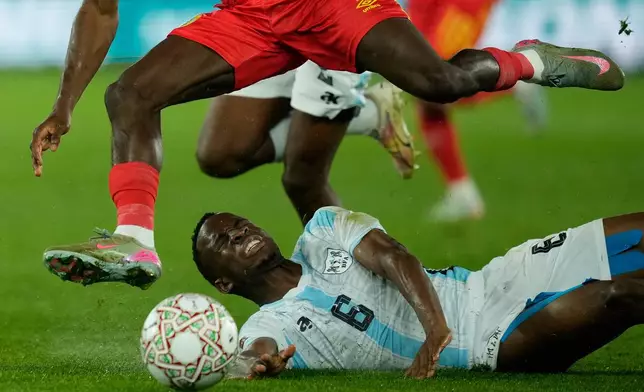 DR Congo's Nathanael Mbuku, top, and Botswana's Gape Edwin Mohutsiwa challenge for the ball during their teams' Africa Cup of Nations group D soccer match in Rabat, Morocco, Tuesday, Dec. 30, 2025. (AP Photo/Mosa'ab Elshamy)