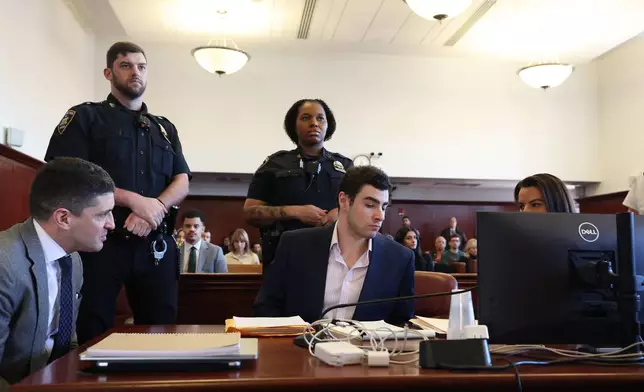 Luigi Mangione appears in Manhattan Criminal Court for an evidence hearing, Tuesday, Dec. 9, 2025, in New York. (William Farrington/New York Post via AP, Pool)