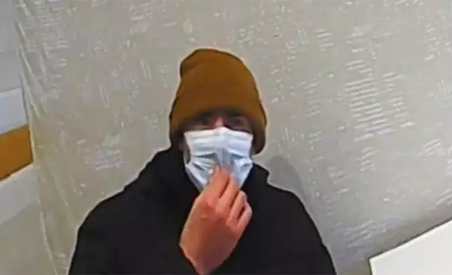 FILE - This image taken from video released by Pennsylvania State Police shows Luigi Mangione, a suspect in the fatal shooting of UnitedHealthcare CEO Brian Thompson, at a McDonald's in Altoona, Pa., on Dec. 9, 2024. (Pennsylvania State Police via AP)