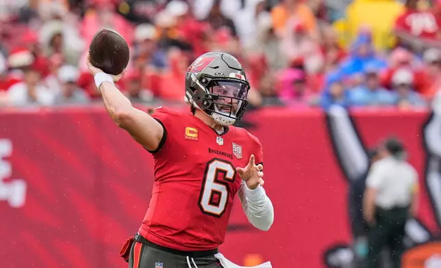Tampa Bay Buccaneers quarterback Baker Mayfield (6) passes against the New Orleans Saints in the first half of an NFL football game, Sunday, Dec. 7, 2025, in Tampa, Fla. (AP Photo/Chris O'Meara)