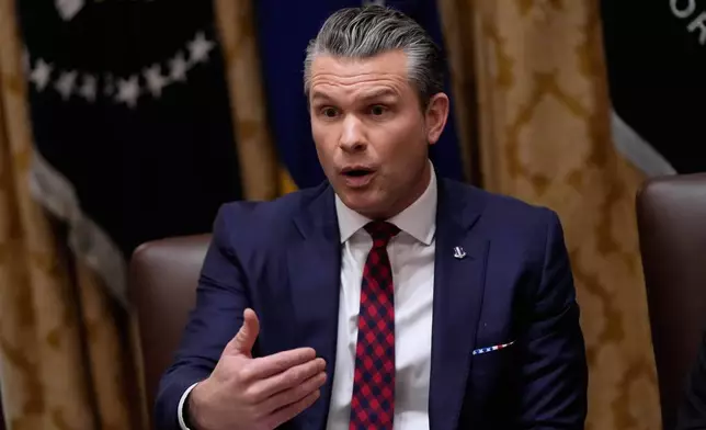 Defense Secretary Pete Hegseth speaks during a Cabinet meeting at the White House, Tuesday, Dec. 2, 2025, in Washington. (AP Photo/Julia Demaree Nikhinson)