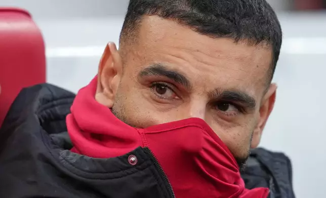 Liverpool's Mohamed Salah sits on the bench before the English Premier League soccer match between Liverpool and Brighton and Hove Albion in Liverpool, England, Saturday, Dec. 13, 2025. (AP Photo/Jon Super)