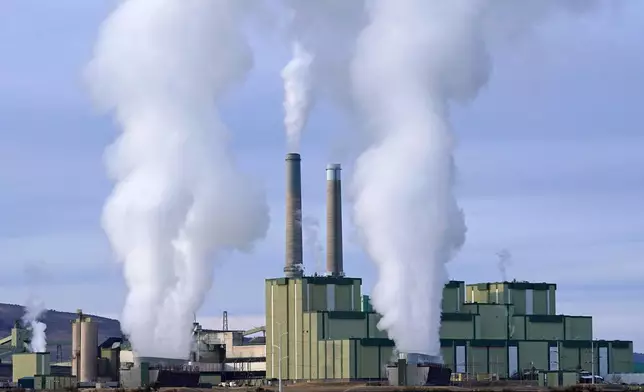 FILE - Craig Power Plant, a coal-fired power plant, operates Nov. 18, 2021, in Craig, Colo. (AP Photo/Rick Bowmer, File)