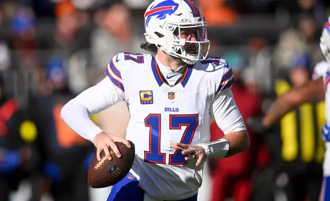 Buffalo Bills quarterback Josh Allen looks to throw against the Cleveland Browns during the first half of an NFL football game in Cleveland, Sunday, Dec. 21, 2025. (AP Photo/David Richard)