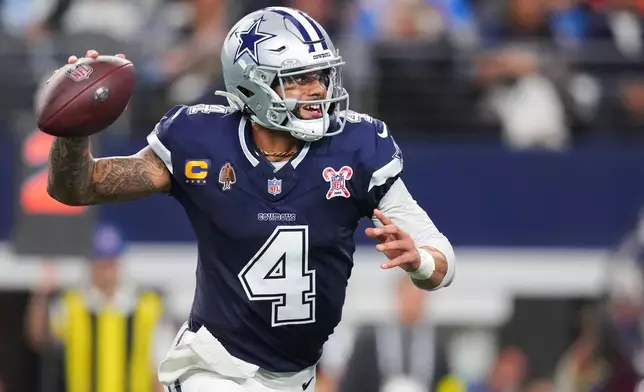 Dallas Cowboys quarterback Dak Prescott (4) prepares to pass during the first half of an NFL football game against the Los Angeles Chargers, Sunday, Dec. 21, 2025, in Arlington, Texas. (AP Photo/Julio Cortez)