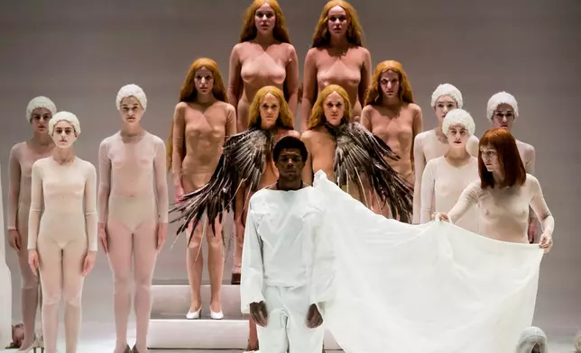 EDS NOTE: NUDITY - Actors perform during the general rehearsal of Ennio Morricone's only opera, Partenope, at the San Carlo Theatre, in Naples, Italy, Thursday, Dec. 11, 2025. (AP Photo/Salvatore Laporta)