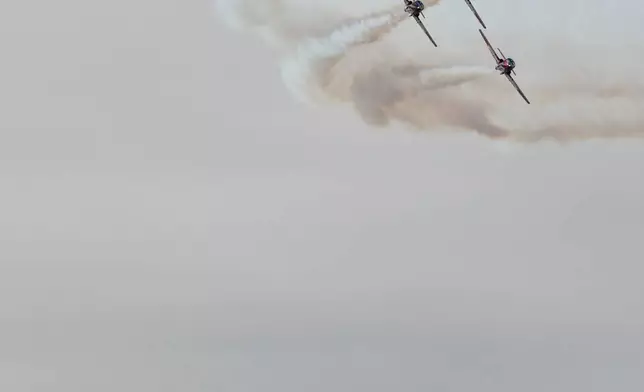 The Canadian Snowbirds fly over the Golden Gate Bridge during the Fleet Week Air Show in San Francisco, Oct. 10, 2025. (AP Photo/Godofredo A. Vásquez, File)