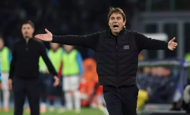Napoli's head coach Antonio Conte reacts during the round of 16 Italian Cup soccer match between Napoli and Cagliari, in Naples, southern Italy, Wednesday, Dec. 3, 2025. (Alessandro Garofalo/LaPresse via AP)