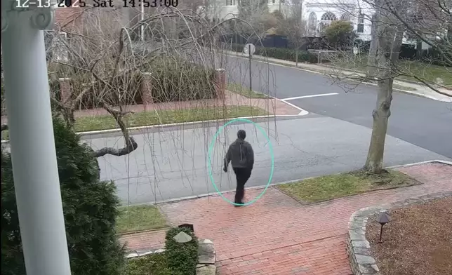 This image taken from video provided by the FBI shows a person of interest in the investigation of the shooting that occurred at Brown University, in Providence, R.I., Saturday, Dec. 13, 2025. (FBI via AP)