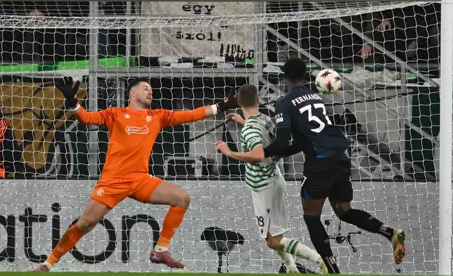 Ferencvaros' Barnabas Varga scores during the Europa League opening phase soccer match between Ferencvaros and Rangers in Budapest, Hungary, Thursday, Dec. 11, 2025. (AP Photo/Denes Erdos)