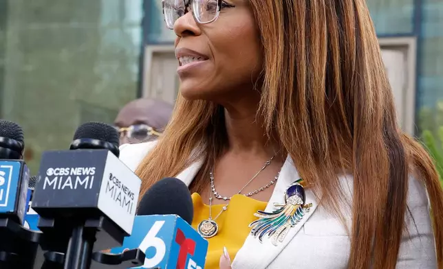 CORRECTS TO HEARING, NOT ARRAIGNMENT - U.S. Rep. Sheila Cherfilus-McCormick, D-Fla., speaks to the media after a hearing in federal court Monday, Dec. 29, 2025 in Miami. (AP Photo/Terry Renna)
