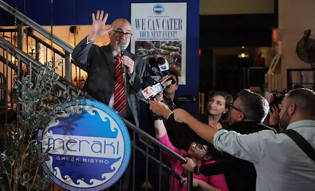 Miami mayor candidate Emilio Gonzalez, a former city manager backed by President Donald Trump, waves as he thanks supporters after conceding to Democrat Eileen Higgins in Miami's mayoral runoff election, at a watch party, in downtown Miami, Tuesday, Dec. 9, 2025. (AP Photo/Rebecca Blackwell)