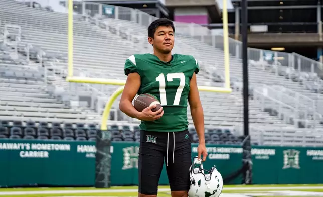 Hawaii place kicker Kansei Matsuzawa, of Japan, poses for a portrait at Clarence T.C. Ching Athletics Complex, Tuesday, Dec. 16, 2025, in Honolulu. (AP Photo/Mengshin Lin)