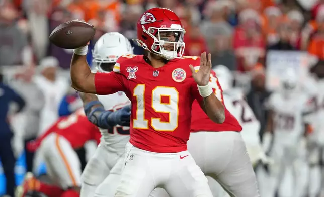Kansas City Chiefs quarterback Chris Oladokun throws a pass against the Denver Broncos during the second half of an NFL football game Thursday, Dec. 25, 2025, in Kansas City. (AP Photo/Ed Zurga)