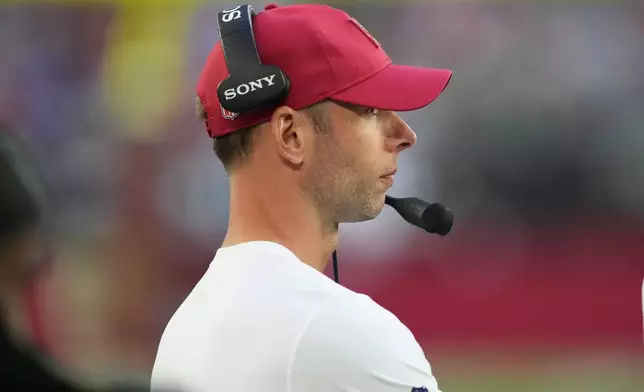 Arizona Cardinals head coach Jonathan Gannon looks on in the second half of an NFL football game against the Los Angeles Rams, Sunday, Dec. 7, 2025, in Glendale, Ariz. (AP Photo/Ross D. Franklin)